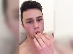 cute twink enjoys the taste of his own cum