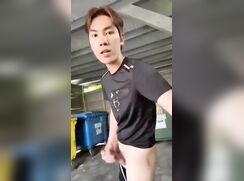Big dick Asian Twink taking a work break to pop-off a big load outside