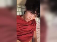 tanned asian jerks his lubed cock