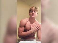 Muscular young man in shorts jerks off