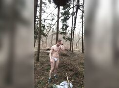 AHV - Guy throws his clothes in the forest