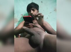 guy on the playing with his phone