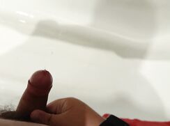 Hairy chubby with a small dick cumming in bathroom