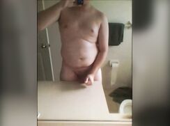 chubby boy cums all over the bathroom mirror