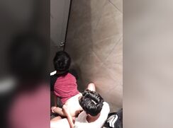 asian teens in a public toilet
