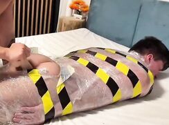 dildo for completely wrapped teen bottom