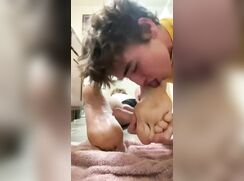 Licking his straight friend's feet