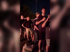 A boy receives kisses from all his friends
