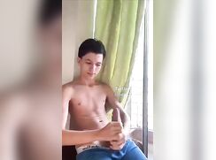 Sam jerks his monstrous cock for us