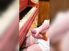 Hot ginger cums at piano