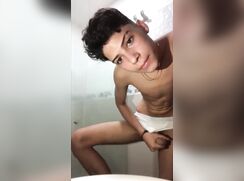 Latino twink in white briefs showers and jerks thick uncut cock