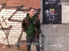 CH 390, Camera guy pays a young guy in a camo hooded jacket and a green hoodie, to su