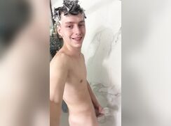 AHV - White teen strokes his cock in the shower with a toy!