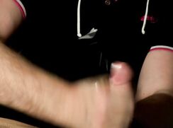 Big cock milked by guy in black shirt