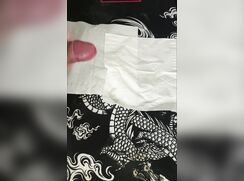 boy cums on napkin