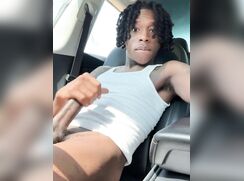 Black twink stroking in car