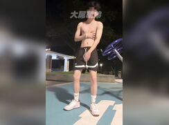 Asian boy wanks on public place