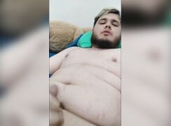 Chubby teen cums on his chest