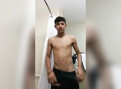 Cute Latino twink strokes his cock before his shower