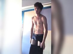 Horny twink strips and strokes his cock to cum shot