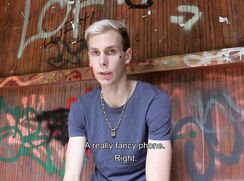 CH 537, Camera guy pays a young guy in blue T sitting at train waiting area to suck a