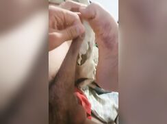 Uncut guy stretches his foreskin