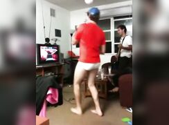 William playing Guitar Hero in his underpants 2010