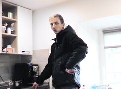 CH 610, Camera guy pays a young guy in a black and grey jacket holding a stone masons