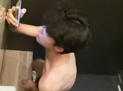 Boys jerking it in the stall