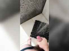 Brazilian guy jerks off in the showers