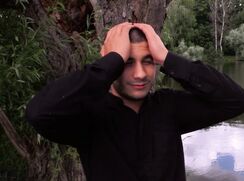 CH 628, Camera guy pays a young guy in a black shirt sleeping under a tree, to suck a