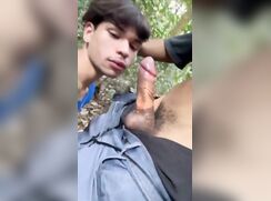 Cute Latino sucks cock in the woods