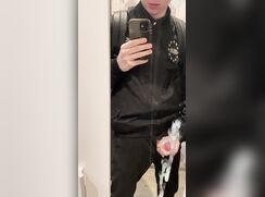 Twink jerks in front of the mirror and cums