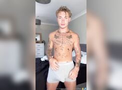 cute tattoed blonde showing his cock