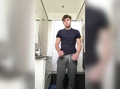 Fraternity dude jerking off in the barthroom mirror and cumming