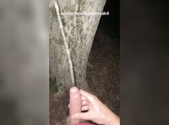 Squirting piss and cum on a tree in public - Aumphreak 05
