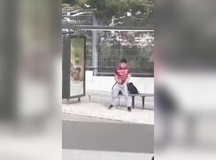 Horny guy jerks-off at the bus stop. Normalize this.