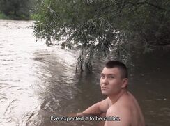 CH 664, Camera guy pays a young guy in a pair of black trunks cooling down in