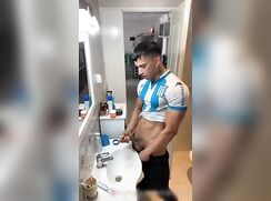 Soccer Player Jerks His Giant Cock in Bathroom