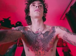 Tattooed Guy Stroking His Uncut Cock on Cam