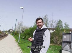 CH 743, Camera guy pays a young guy in a grey hoodie and a black Gilet, smoking by th