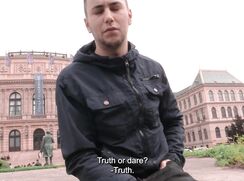 CH 744, Camera guy pays a young guy in a black jacket outside the Czech Philharmonic