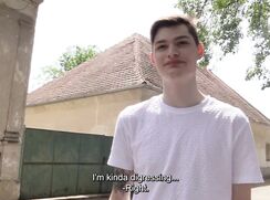 CH 755, Camera guy pays a young guy in a white T and shorts, walking on a tree lined