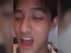 Cutie jerks his uncut cock and eats his cum
