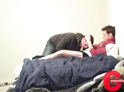 Guy sucks off cute twink on his bed
