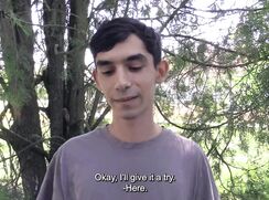 CH 797, Camera guy pays a young guy sitting by a water treatment pool, in a grey top,