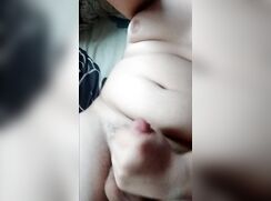 Chubby boy cums on his body