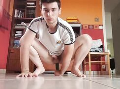 The young boy Noah Lucas is using a cucumber as a dildo on his ass