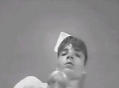 Vintage b/w camera splat as lad cums