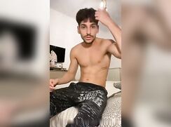 Latino college boy shoots nice load on his abs
